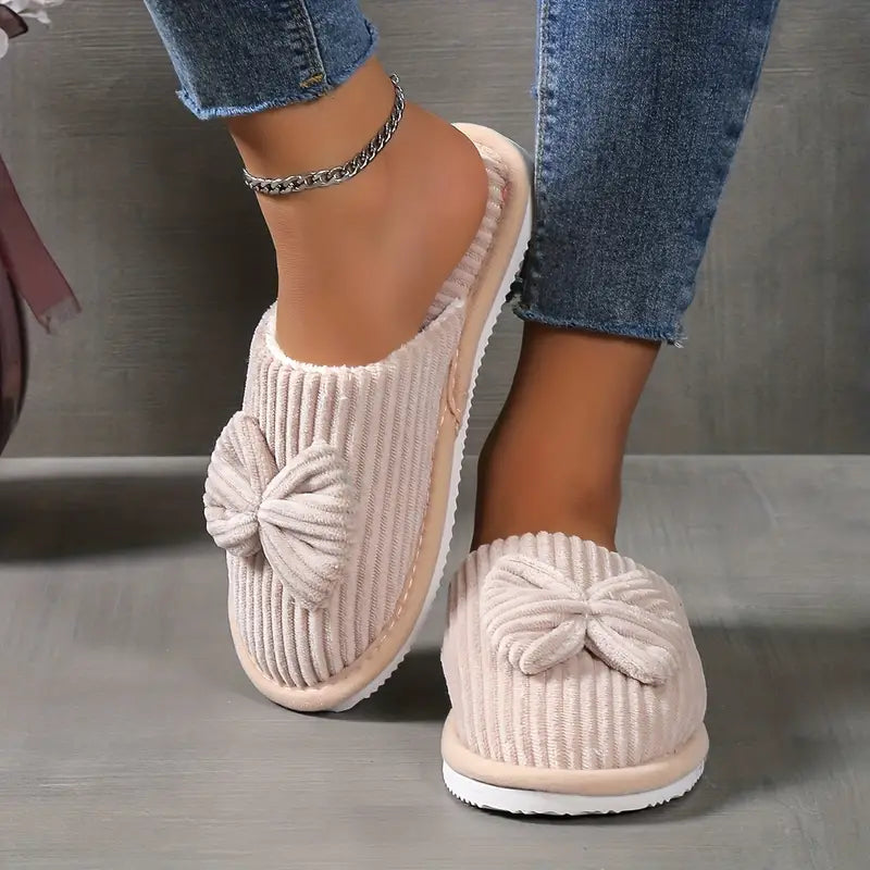 Bowknot winter slippers with plush lining for cozy indoor wear