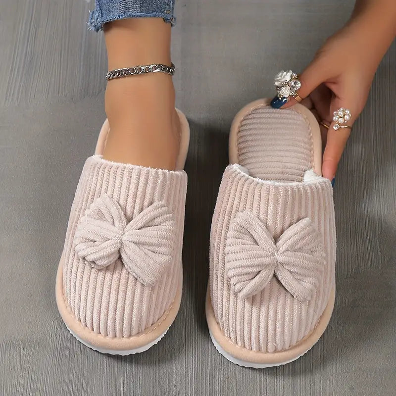 Bowknot winter slippers with plush lining for cozy indoor wear