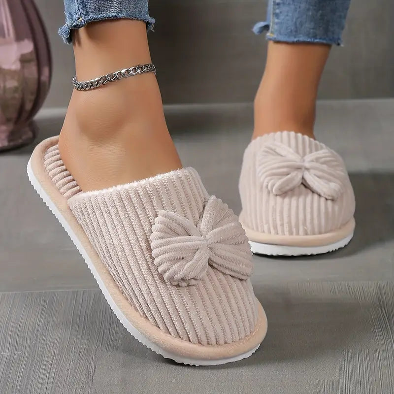 Bowknot winter slippers with plush lining for cozy indoor wear