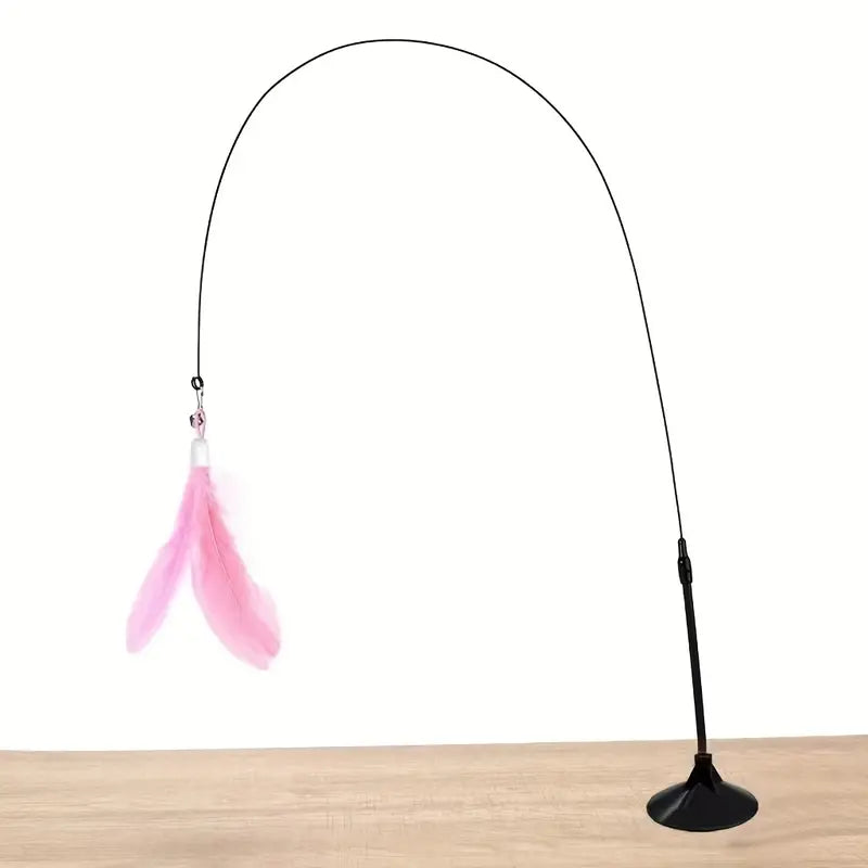 Interactive feather cat toy with suction cup and bell