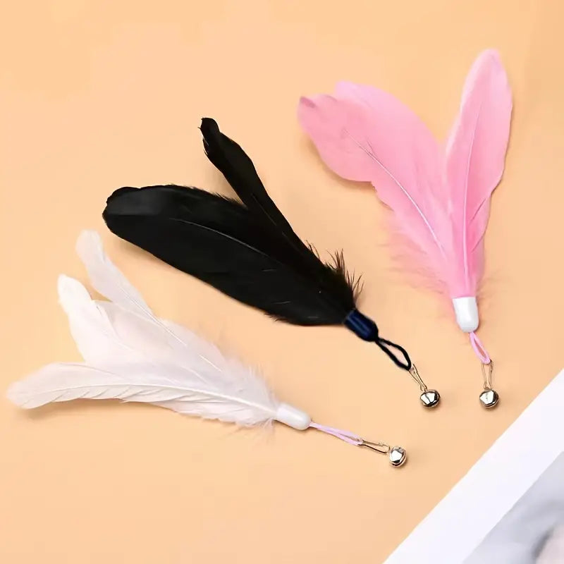 Interactive feather cat toy with suction cup and bell