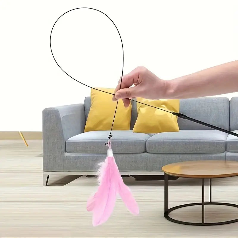 Interactive feather cat toy with suction cup and bell