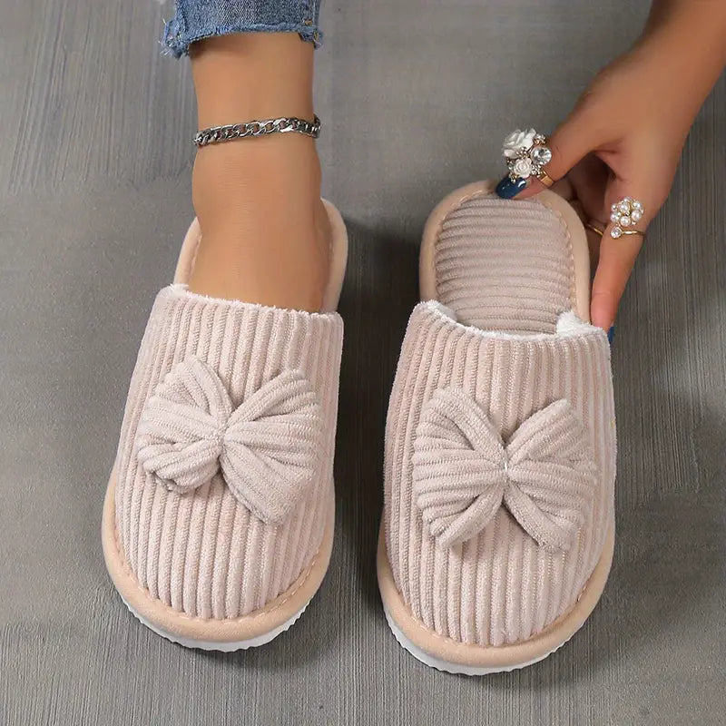 Bowknot winter slippers with plush lining for cozy indoor wear