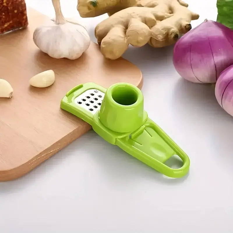 Compact mini garlic press and vegetable cutter in ABS material